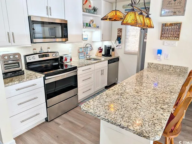 $224,900 | 207 Double Eagle Drive, Unit A1, Surfside Beach, SC 29575