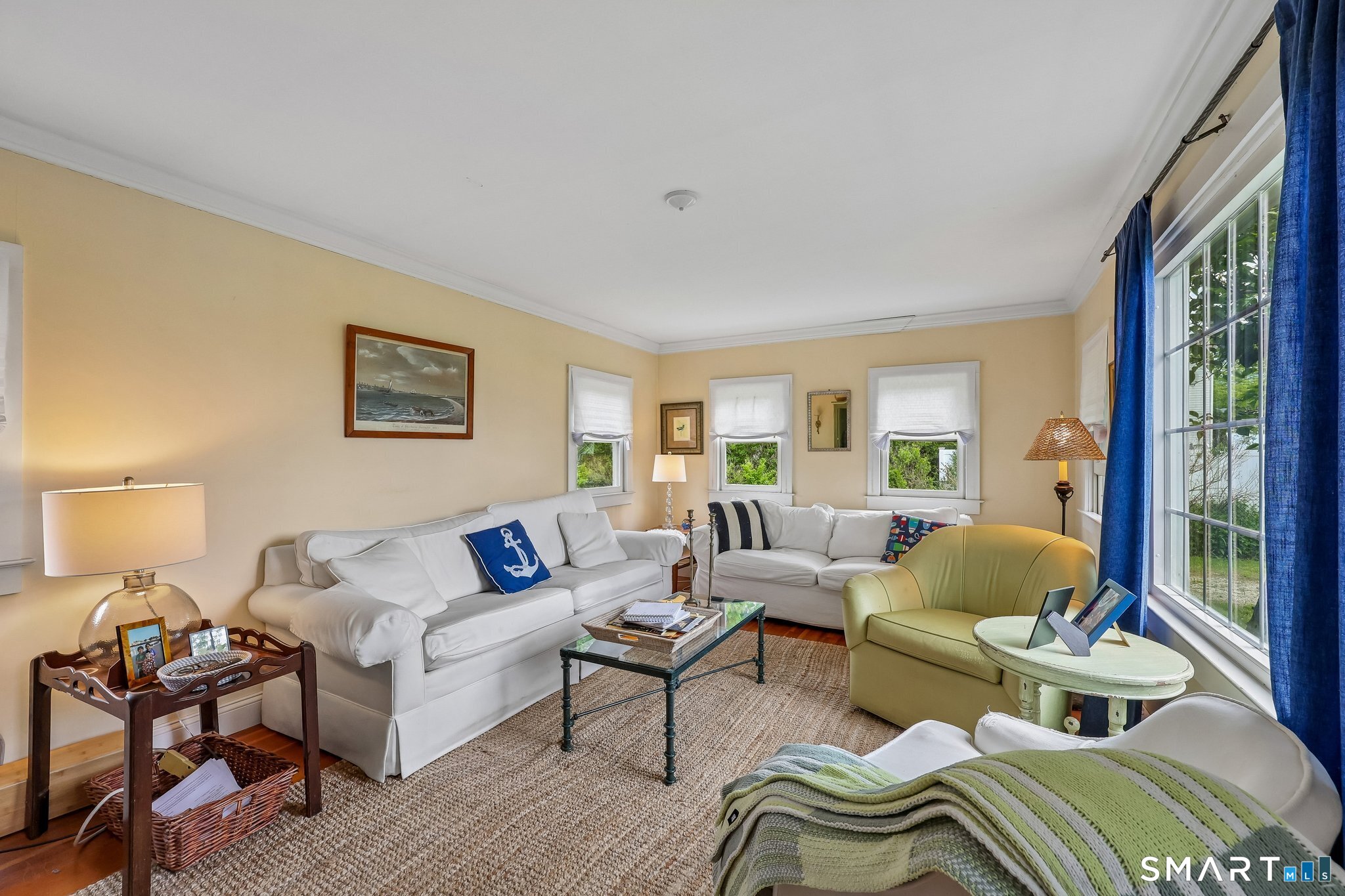 153 Middle Beach Road Madison, CT 06443 - Photo 15 of 40 The family room is located in a private spot on the main floor