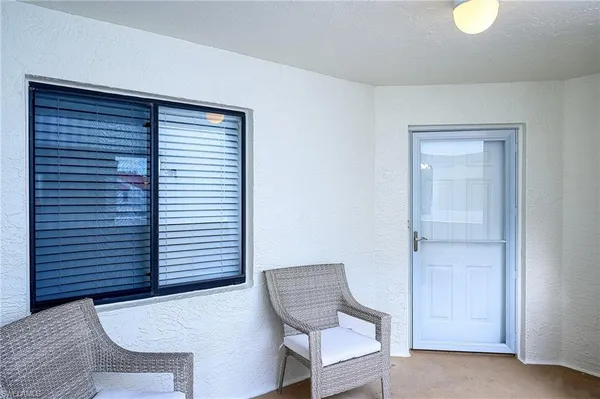 a view of room with window and chair