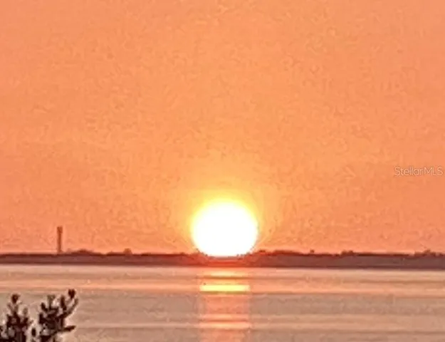 a view of lake and mountain