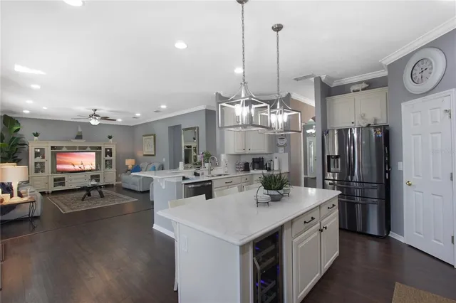 a utility room with sink dryer and washer