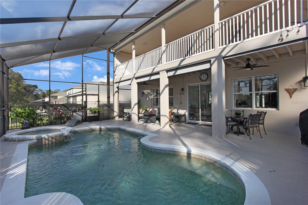 5536 Ansley Way Mount Dora, FL 32757 - Photo 36 of 49 a view of a swimming pool with a patio