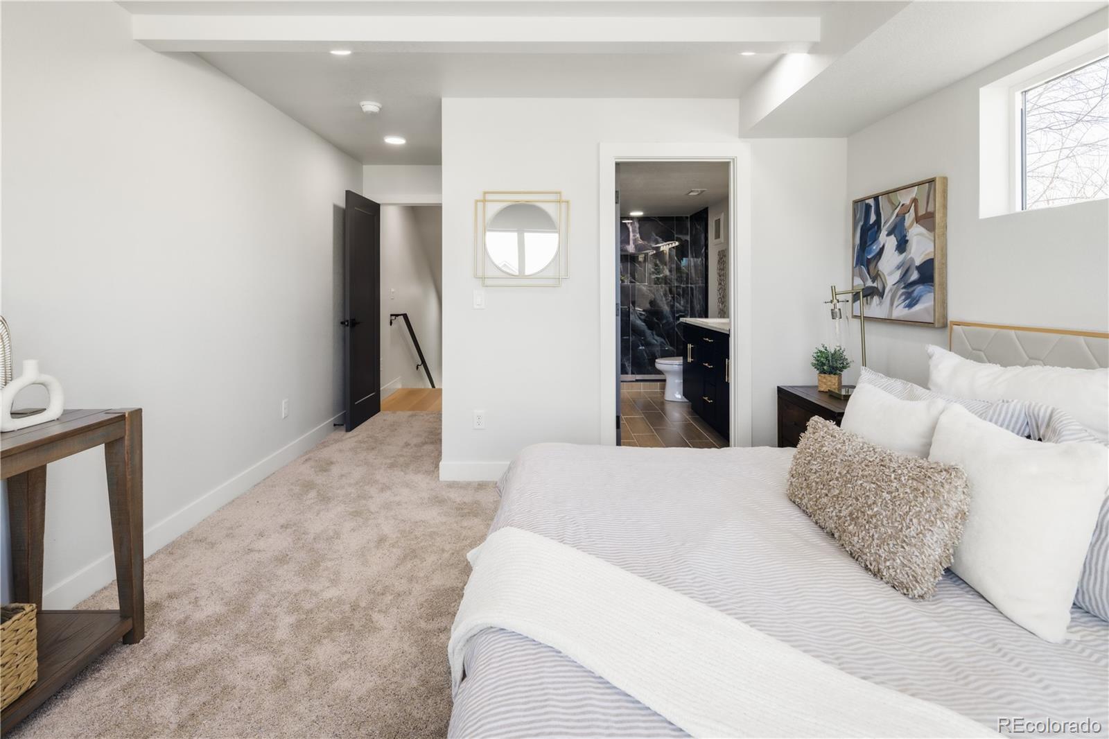 1343 Perry Street Denver, CO 80204 - Photo 23 of 37 a living room with furniture and a flat screen tv