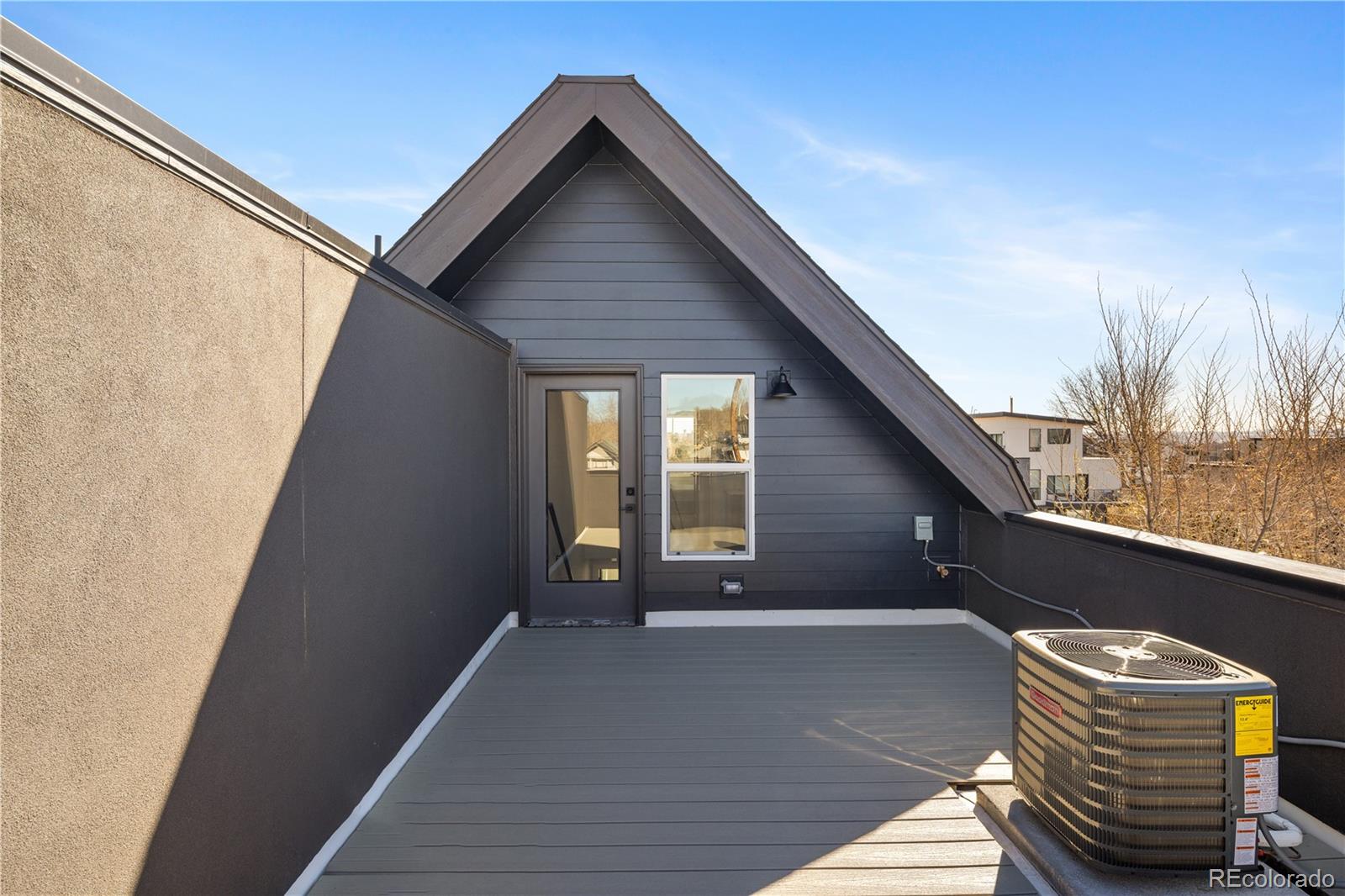 1343 Perry Street Denver, CO 80204 - Photo 30 of 37 a front view of a house with a yard