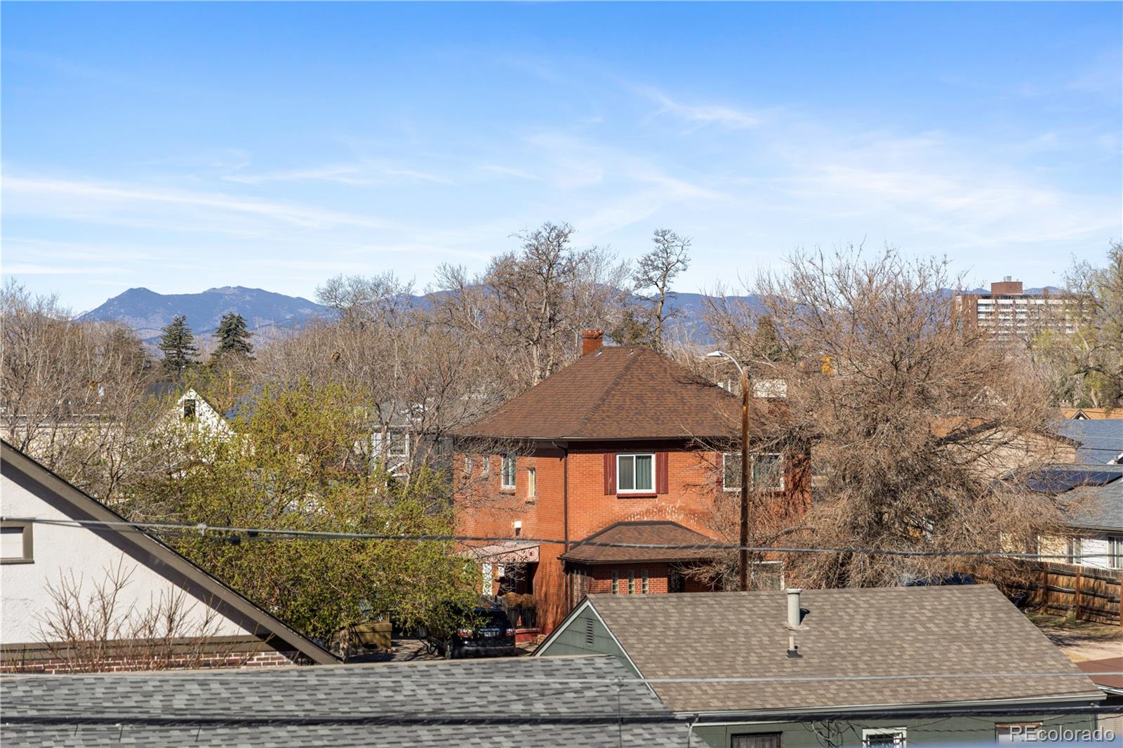 1343 Perry Street Denver, CO 80204 - Photo 31 of 37 a view of a houses with a yard