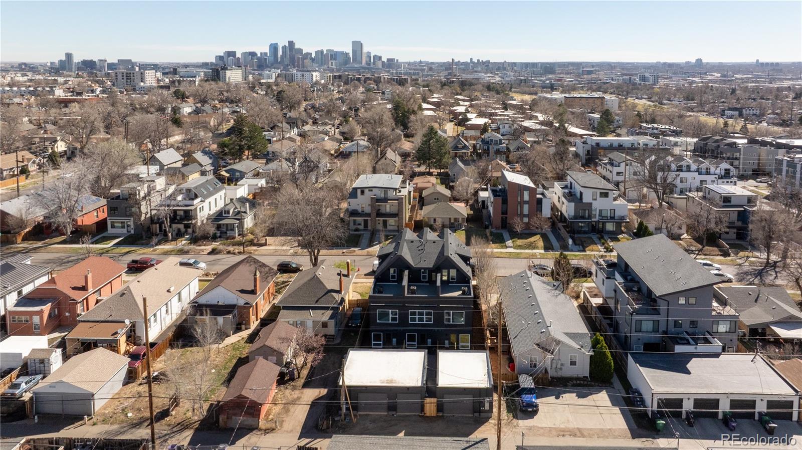 1343 Perry Street Denver, CO 80204 - Photo 36 of 37 an aerial view of a building with parking space