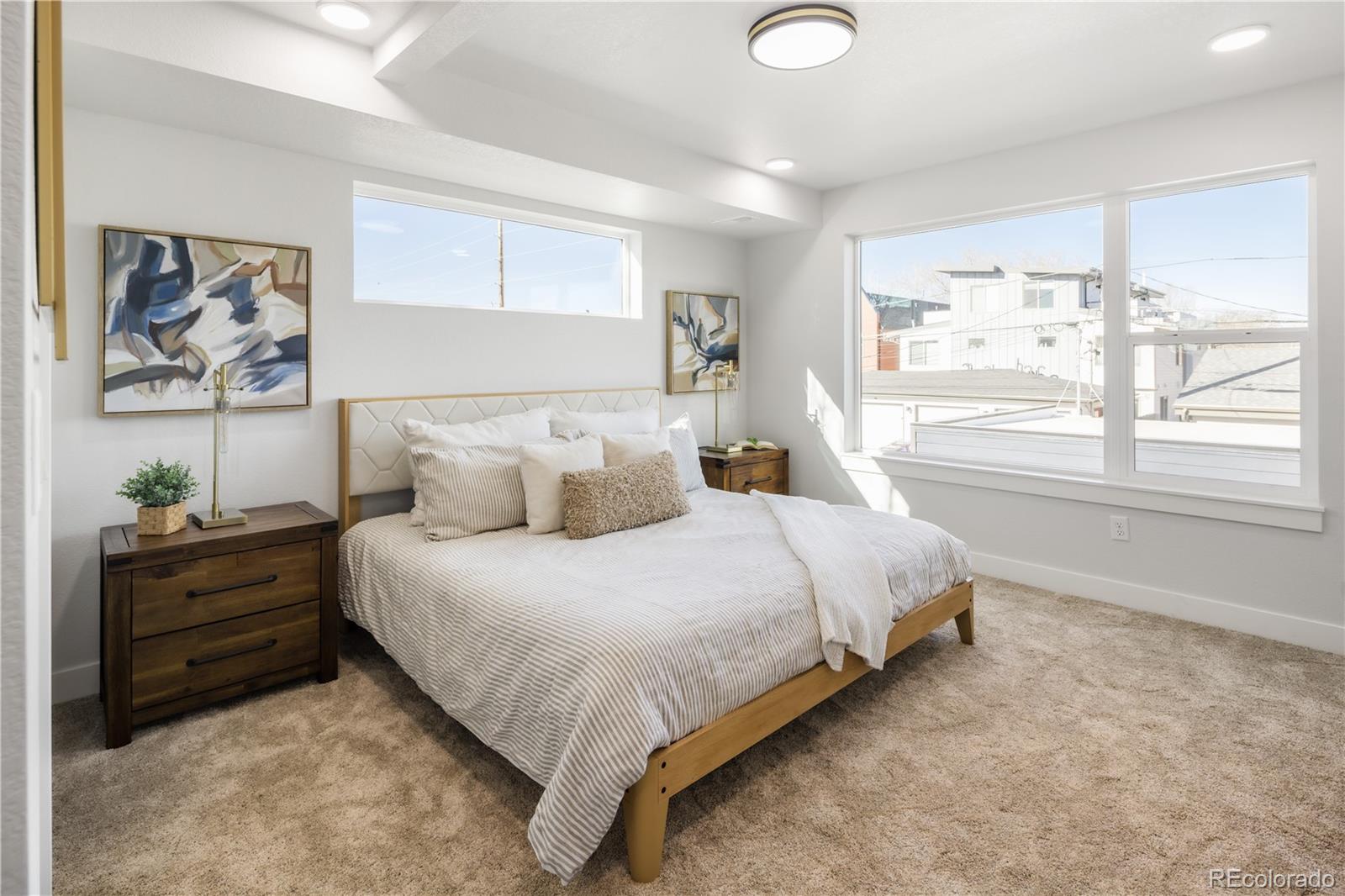 1343 Perry Street Denver, CO 80204 - Photo 4 of 37 a bedroom with bed and window