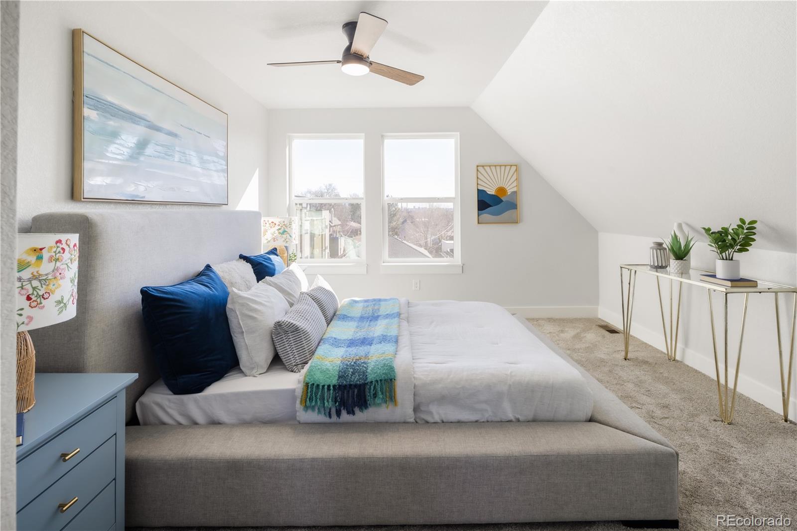 1343 Perry Street Denver, CO 80204 - Photo 6 of 37 a living room with furniture and a large window