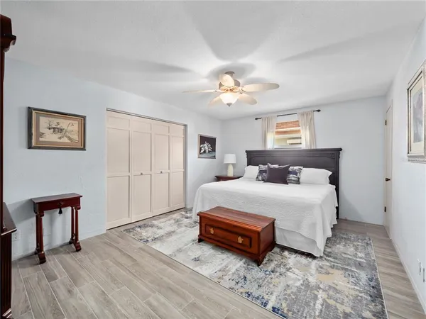 a bathroom with a double vanity sink and mirror