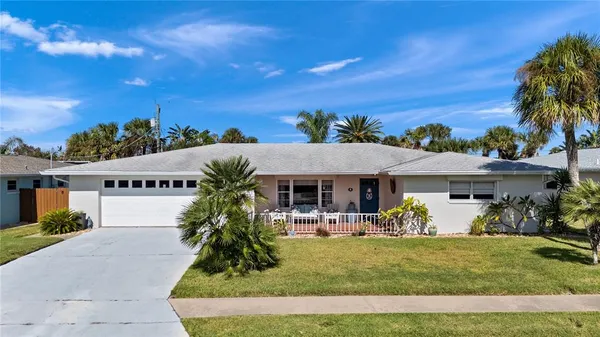 a outdoor space with patio the couches and a potted plant