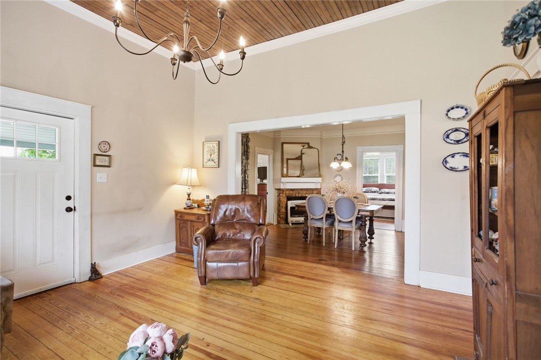 314 South Fairplay Street Seneca, SC 29678 - Photo 10 of 50 This inviting space features hardwood floors, a captivating chandelier, and an open layout.