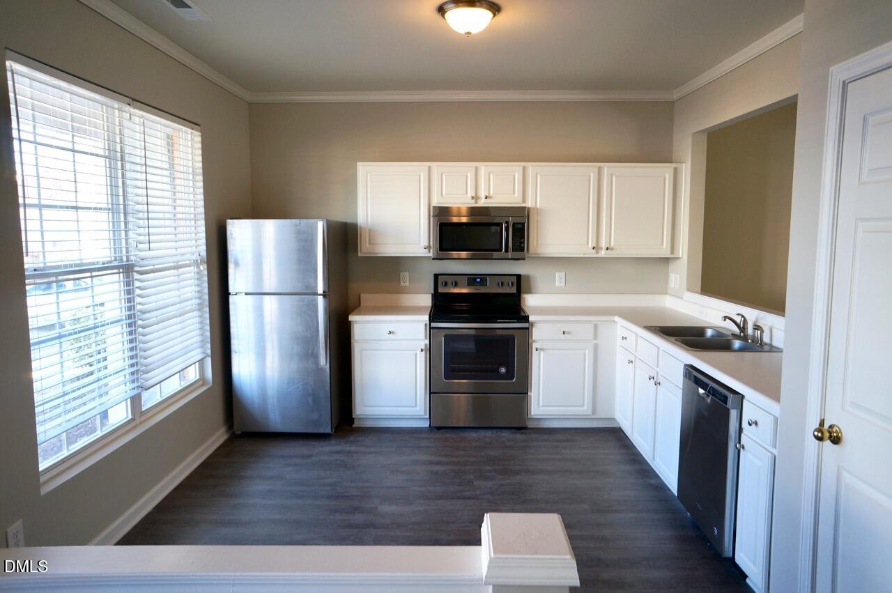 8203 Candelaria Drive Raleigh, NC 27616 - Photo 3 of 14 DSC05749