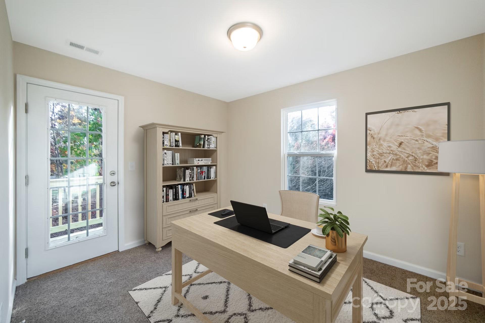 152 Moore's Lake Road, Unit 1 Wadesboro, NC 28170 - Photo 6 of 7 a living room with furniture and window