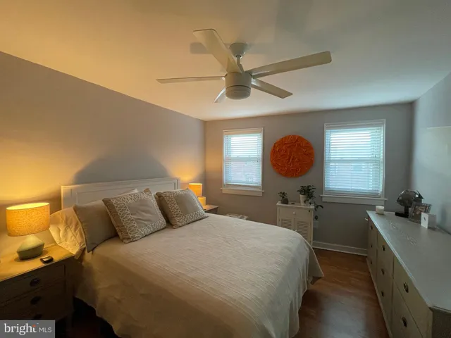 a bedroom with a bed and furniture