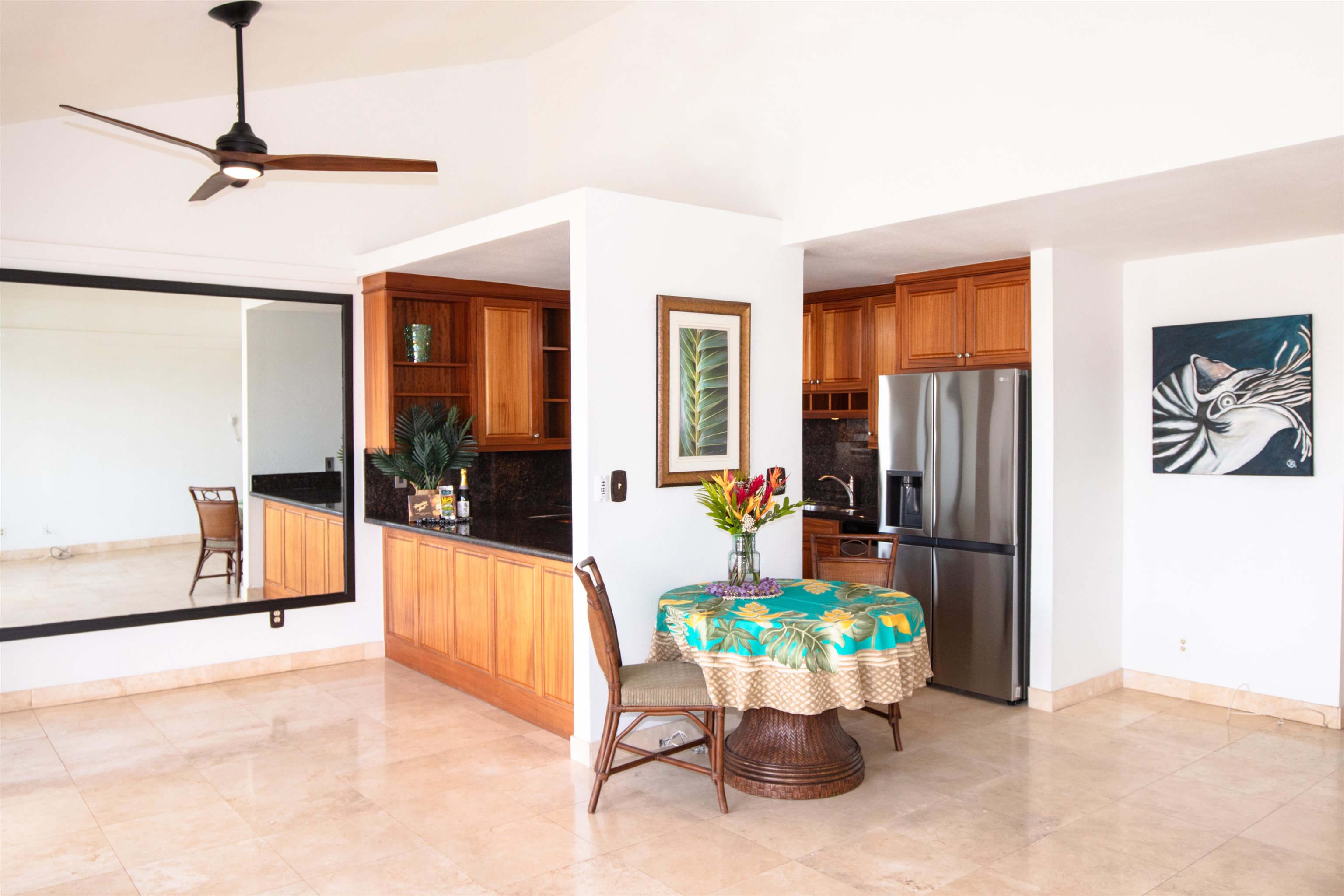 483 South Kihei Road, Unit 217 Kihei, HI 96753 - Photo 4 of 22 a view of a living room and a chandelier