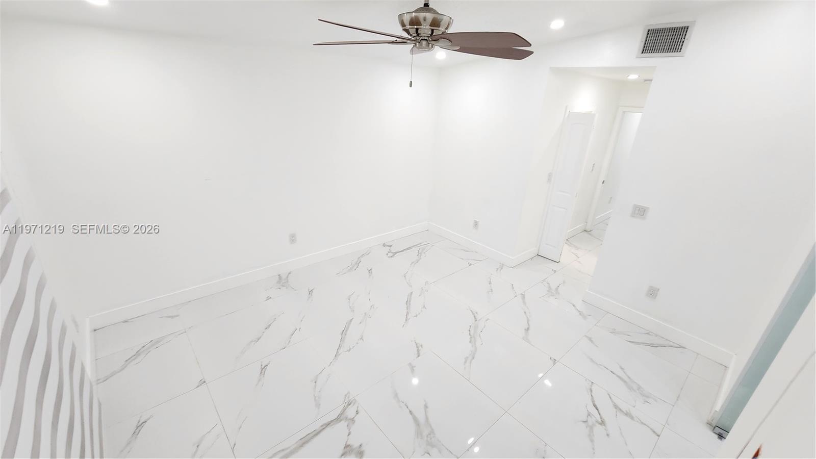 16515 Southwest 97th Street Miami, FL 33196 - Photo 19 of 38 a bathroom with a shower
