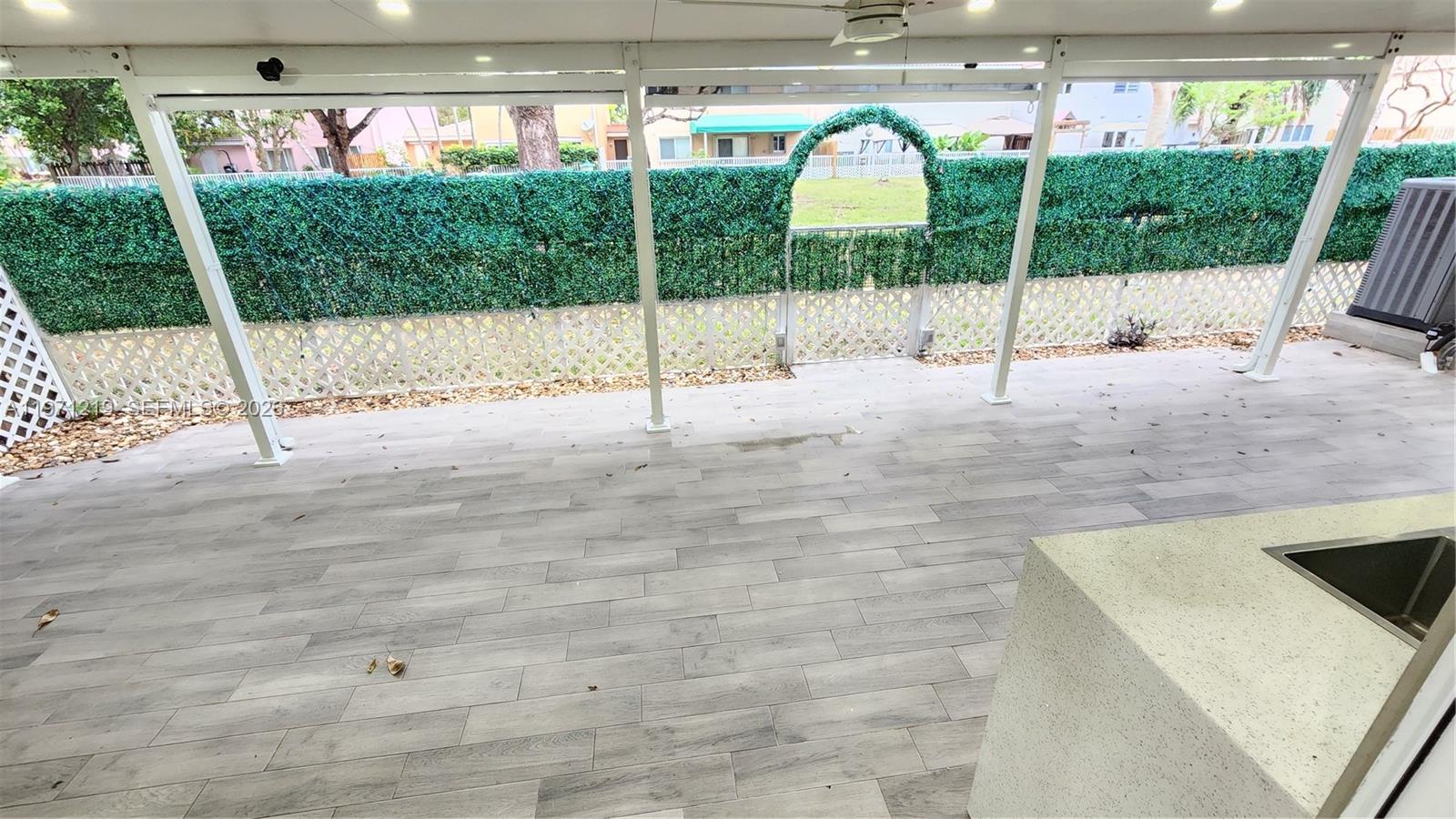 16515 Southwest 97th Street Miami, FL 33196 - Photo 26 of 38 a view of a backyard of a house