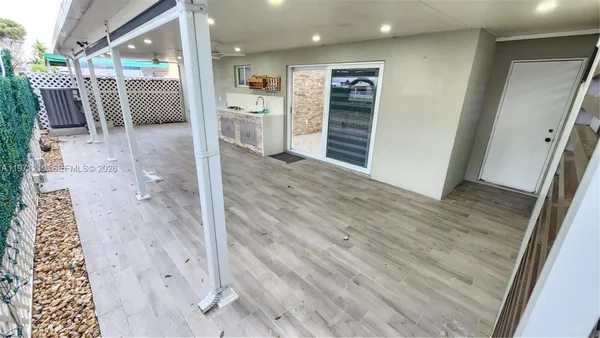 a view of a bedroom from a hallway