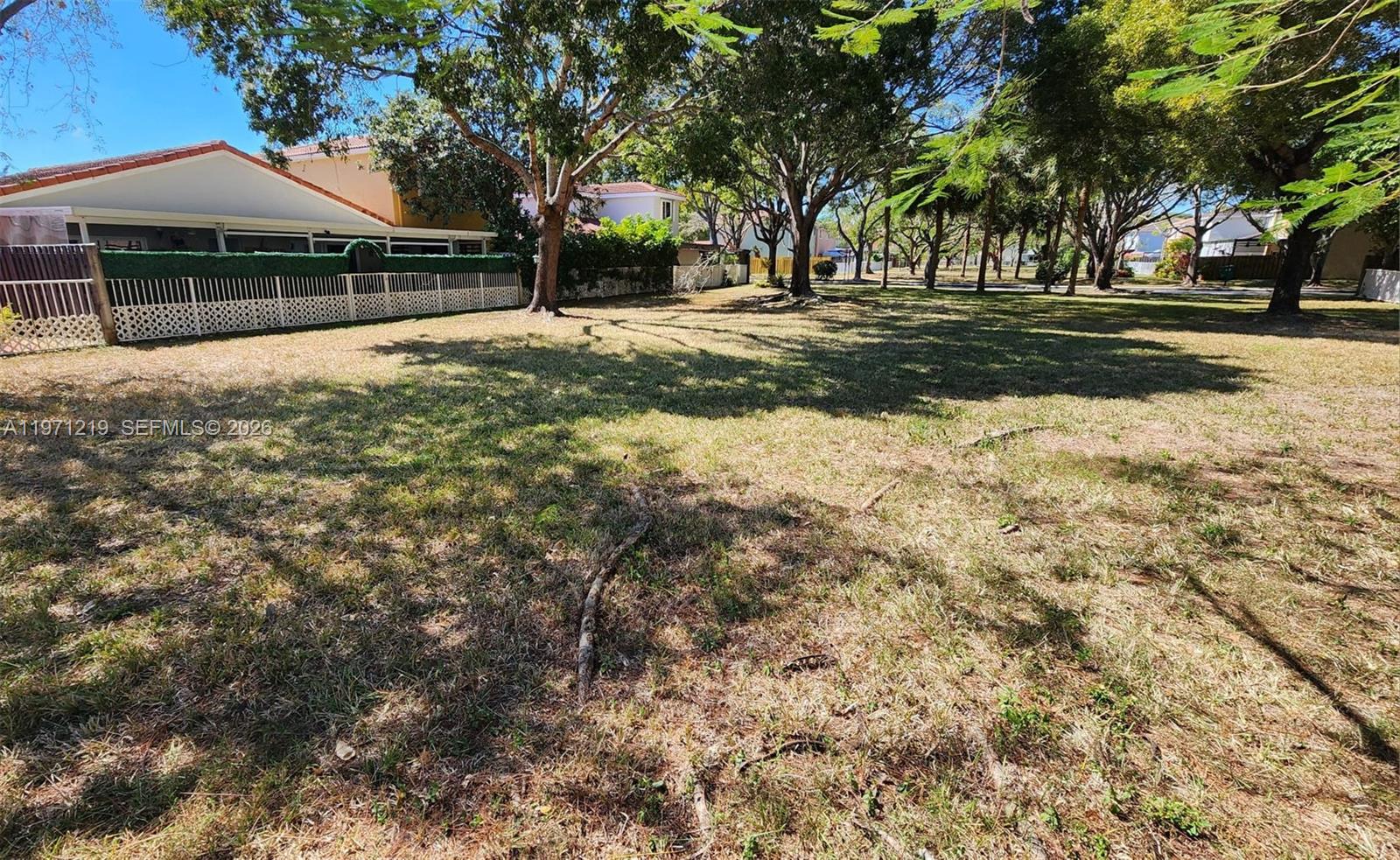 16515 Southwest 97th Street Miami, FL 33196 - Photo 34 of 38 a view of a yard with plants and trees