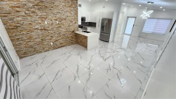 a bathroom with a sink a vanity and mirror