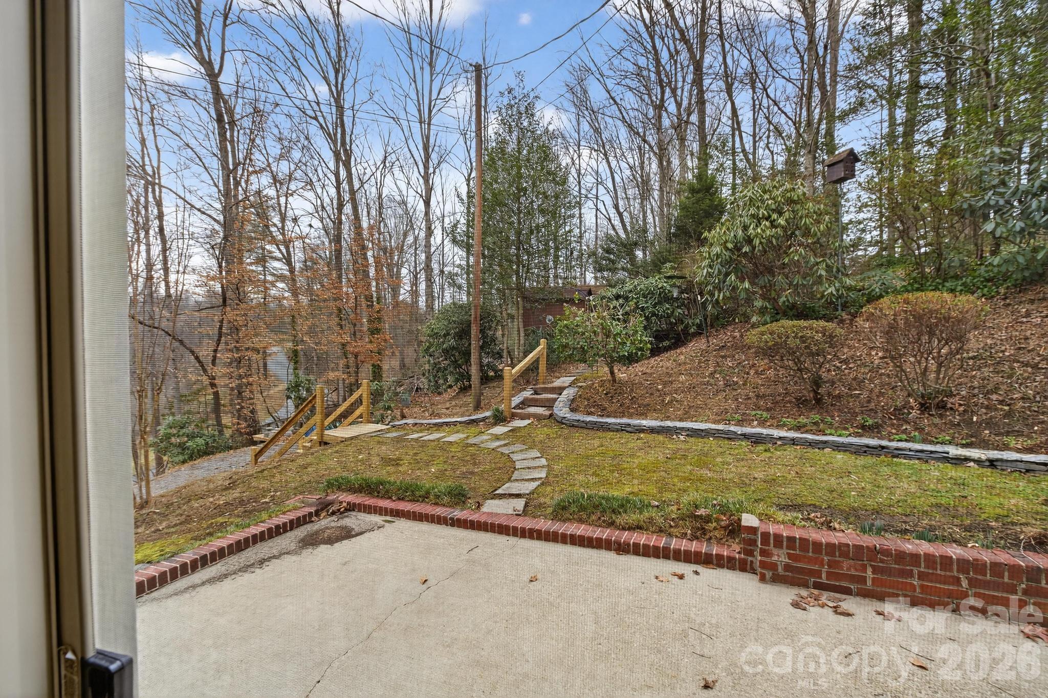 408 Spring Street Northwest Lenoir, NC 28645 - Photo 11 of 47 a view of a backyard