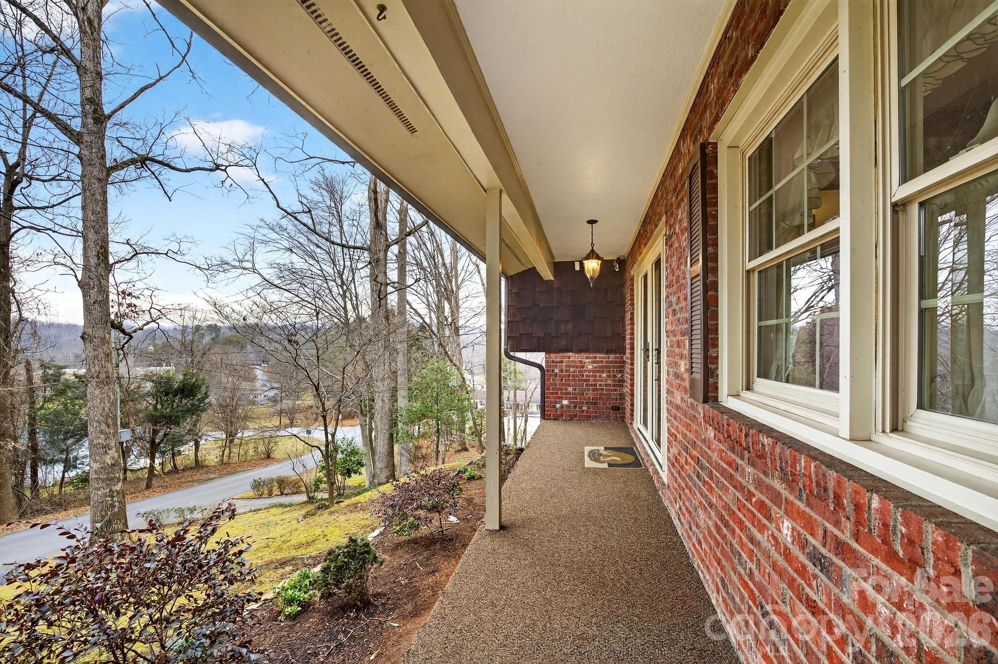 408 Spring Street Northwest Lenoir, NC 28645 - Photo 12 of 47 a view of a pathway with a house