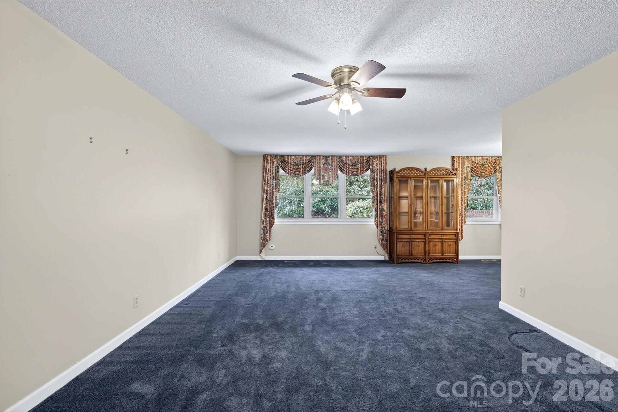 408 Spring Street Northwest Lenoir, NC 28645 - Photo 18 of 47 a view of empty room with window