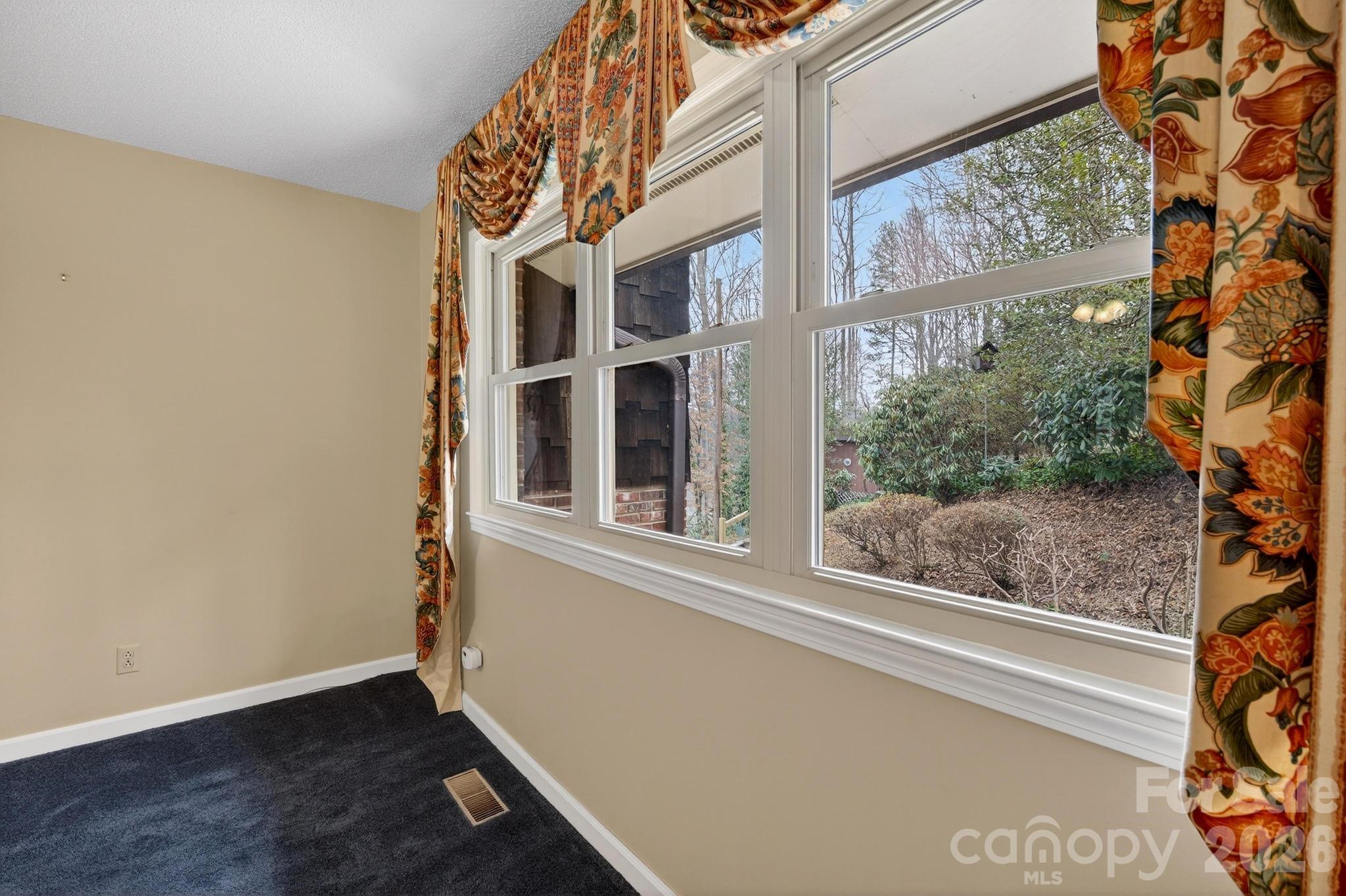 408 Spring Street Northwest Lenoir, NC 28645 - Photo 21 of 47 a view of a building from a window