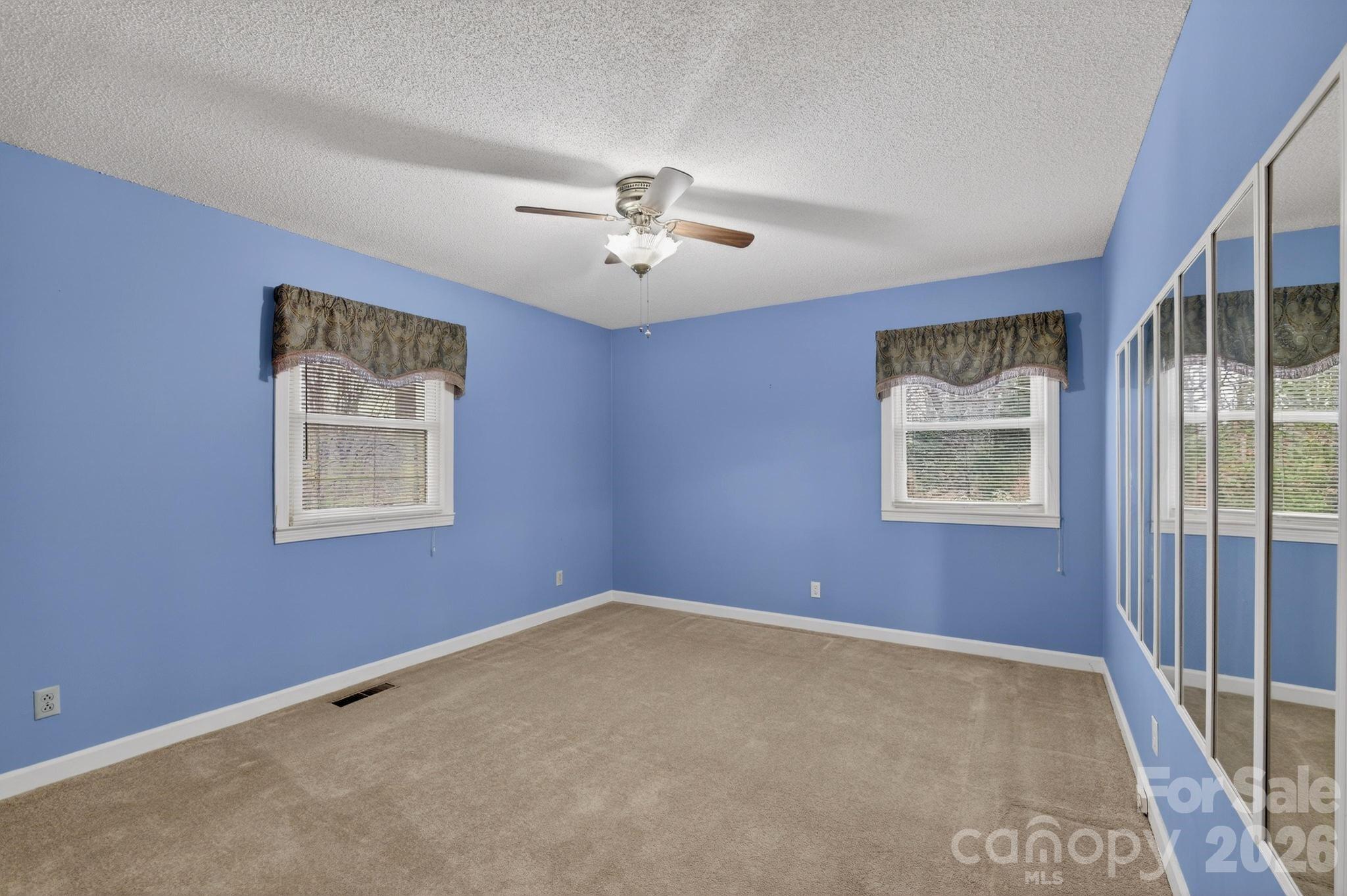 408 Spring Street Northwest Lenoir, NC 28645 - Photo 32 of 47 a view of an empty room with a window