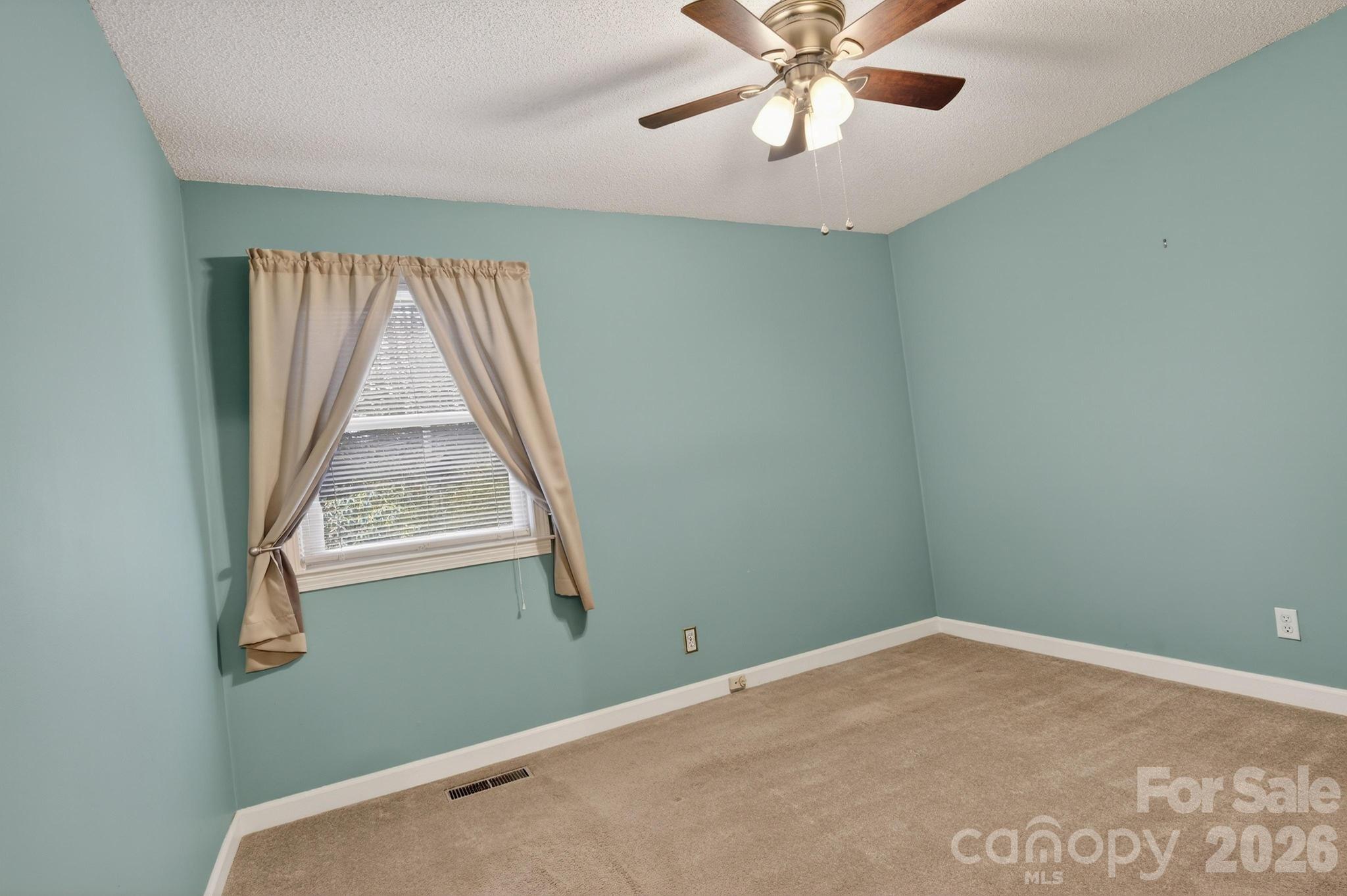 408 Spring Street Northwest Lenoir, NC 28645 - Photo 35 of 47 a view of empty room with window