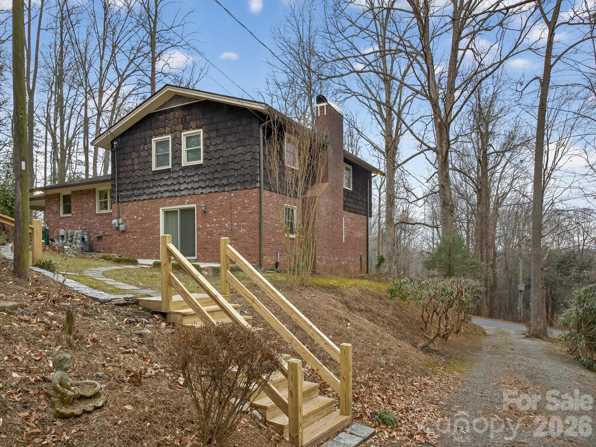 408 Spring Street Northwest Lenoir, NC 28645 - Photo 6 of 47 a front view of a house with a yard