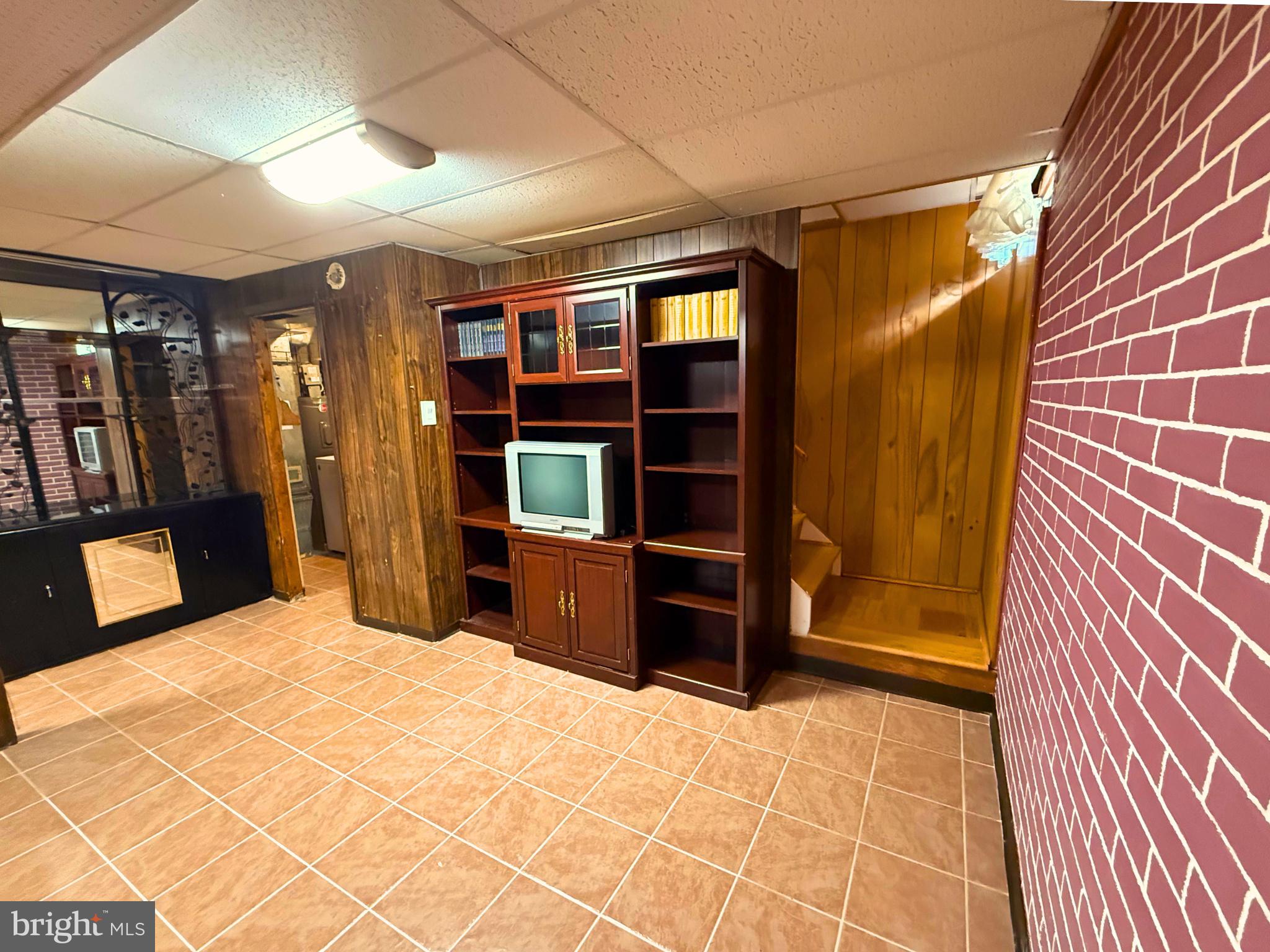 5 Coliston Road, Unit C Reisterstown, MD 21136 - Photo 16 of 39 a bedroom with a bed and wooden floor