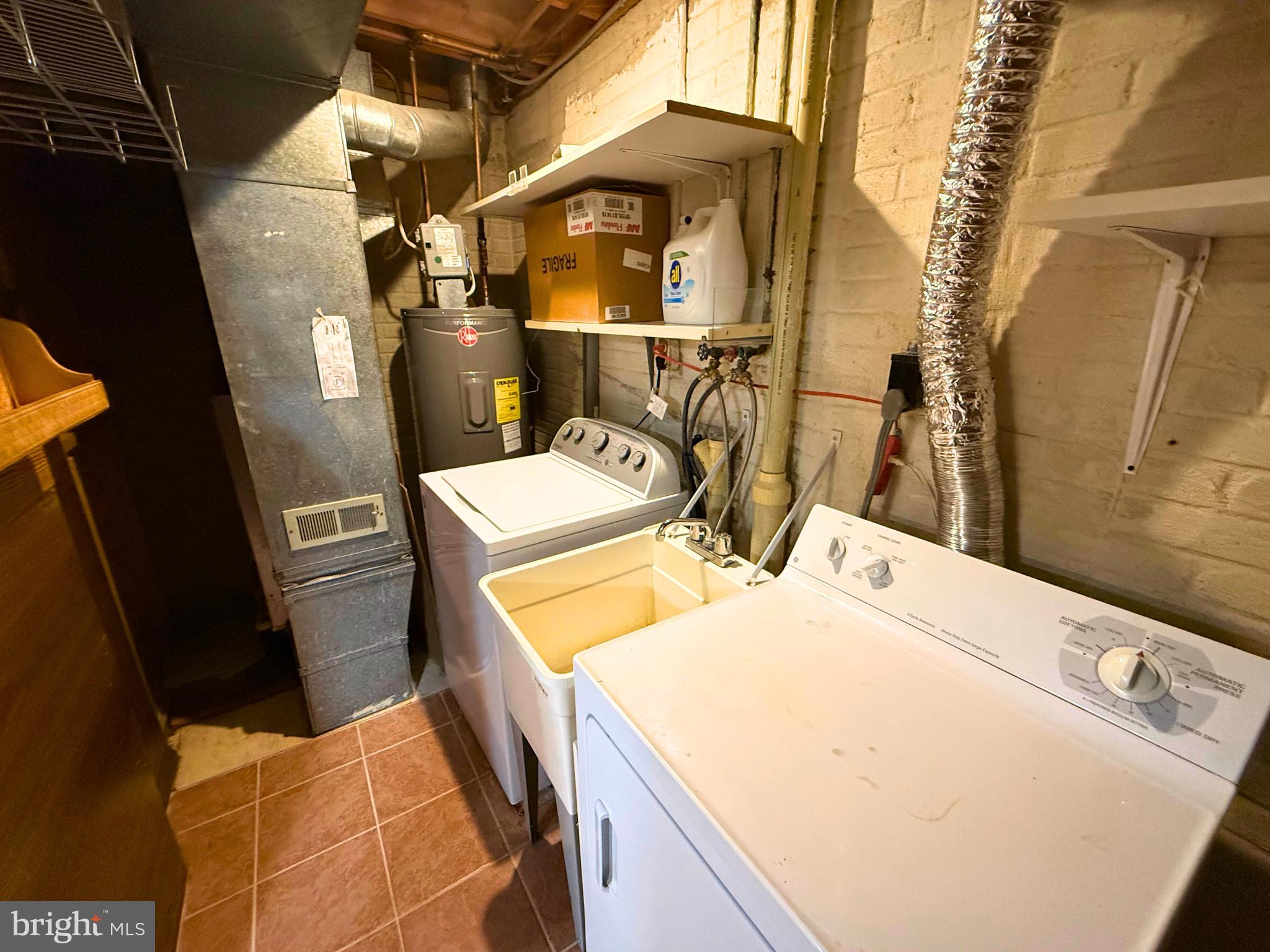5 Coliston Road, Unit C Reisterstown, MD 21136 - Photo 17 of 39 a utility room with dryer and washer