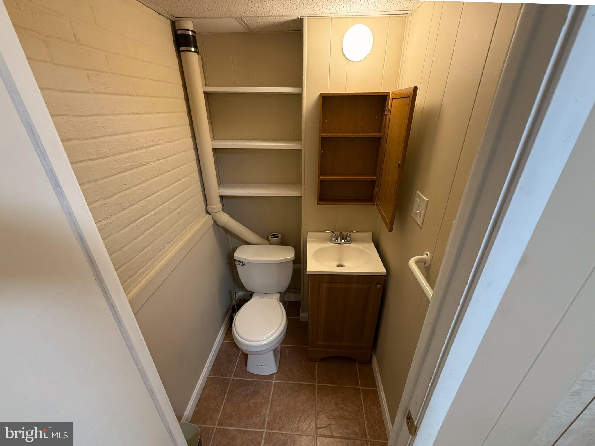 5 Coliston Road, Unit C Reisterstown, MD 21136 - Photo 22 of 39 a bathroom with a toilet and a sink