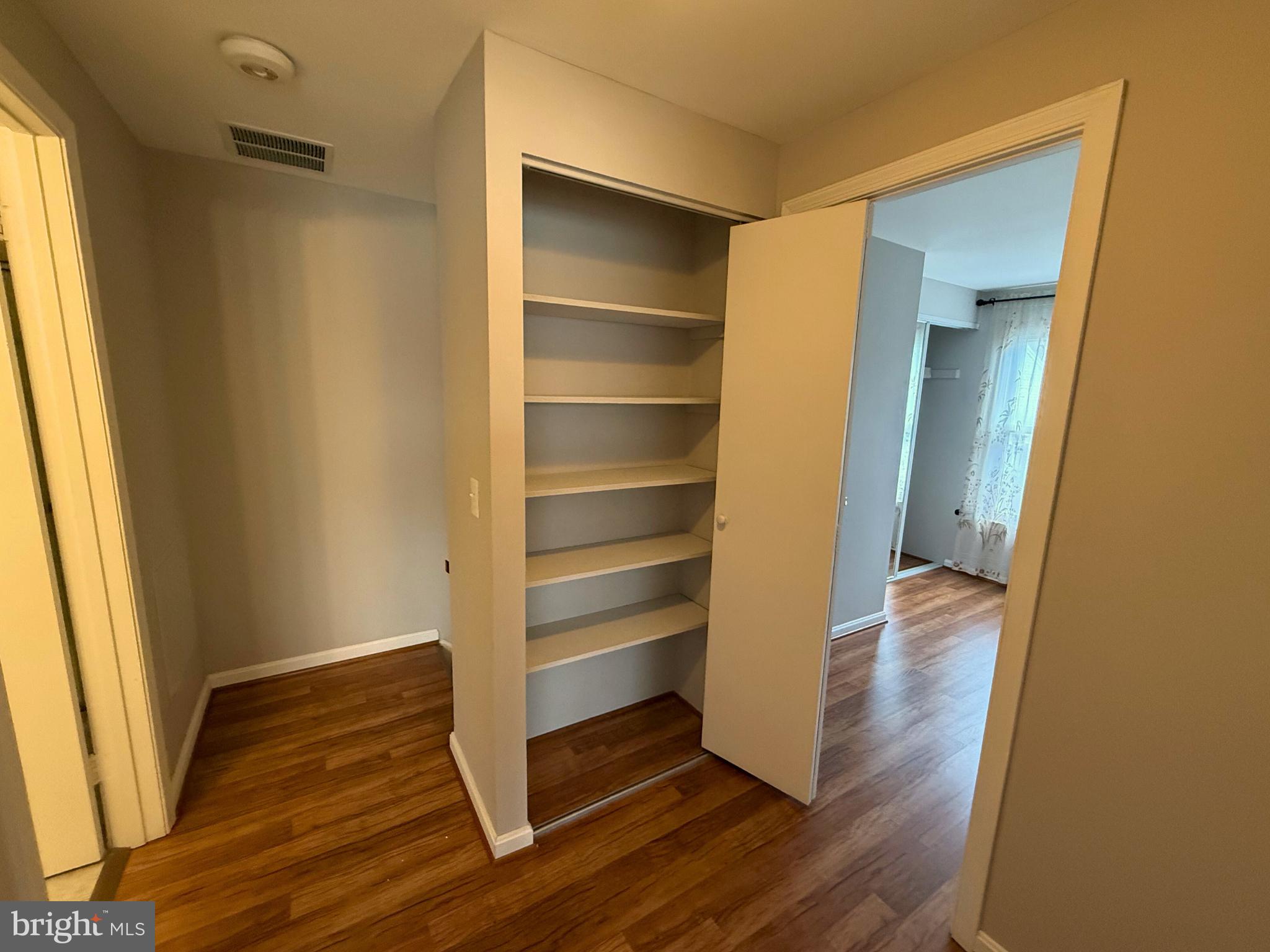 5 Coliston Road, Unit C Reisterstown, MD 21136 - Photo 34 of 39 a view of walk in closet with empty racks