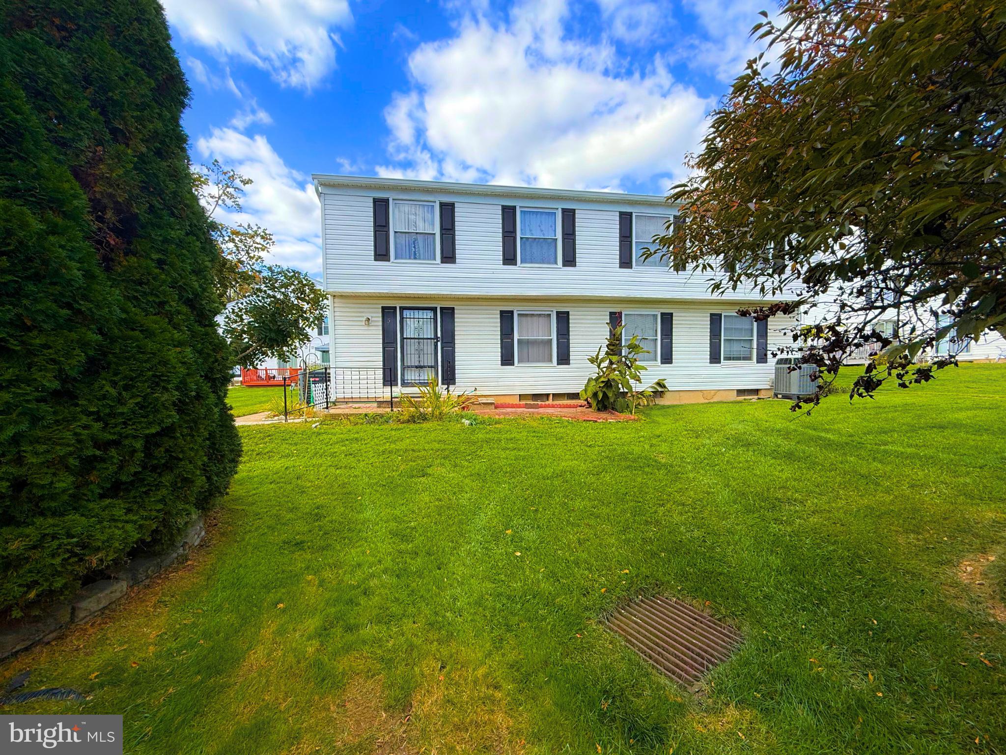5 Coliston Road, Unit C Reisterstown, MD 21136 - Photo 6 of 39 a front view of a house with garden