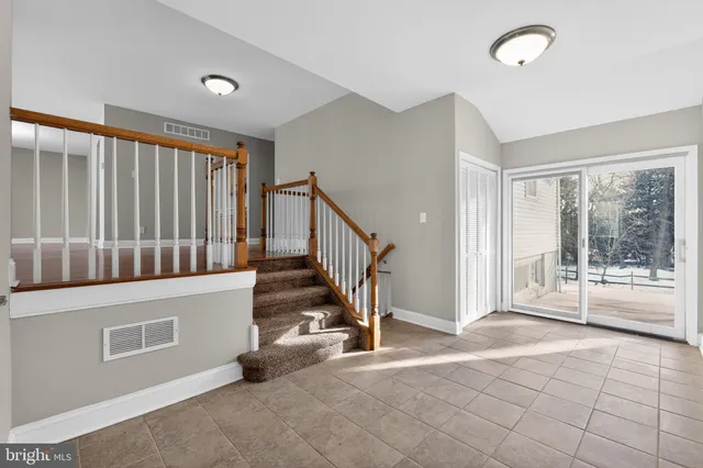 a view of entryway with stairs