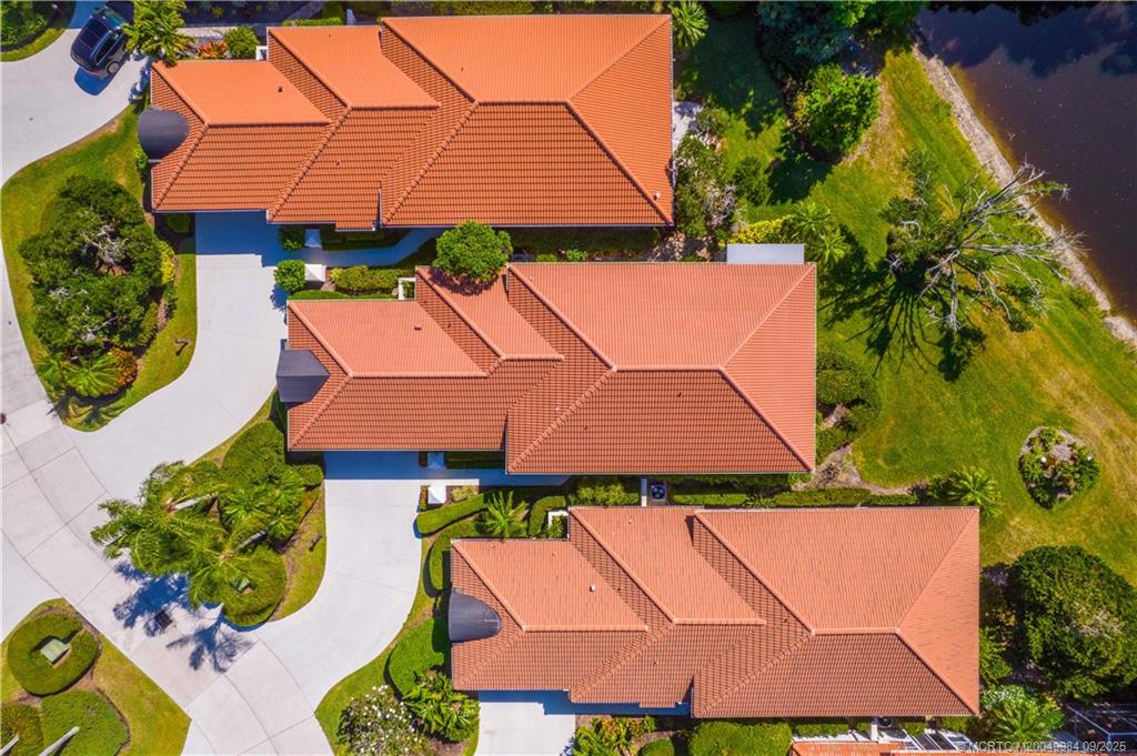 13005 Harbour Ridge Boulevard Palm City, FL 34990 - Photo 31 of 40 an aerial view of a house