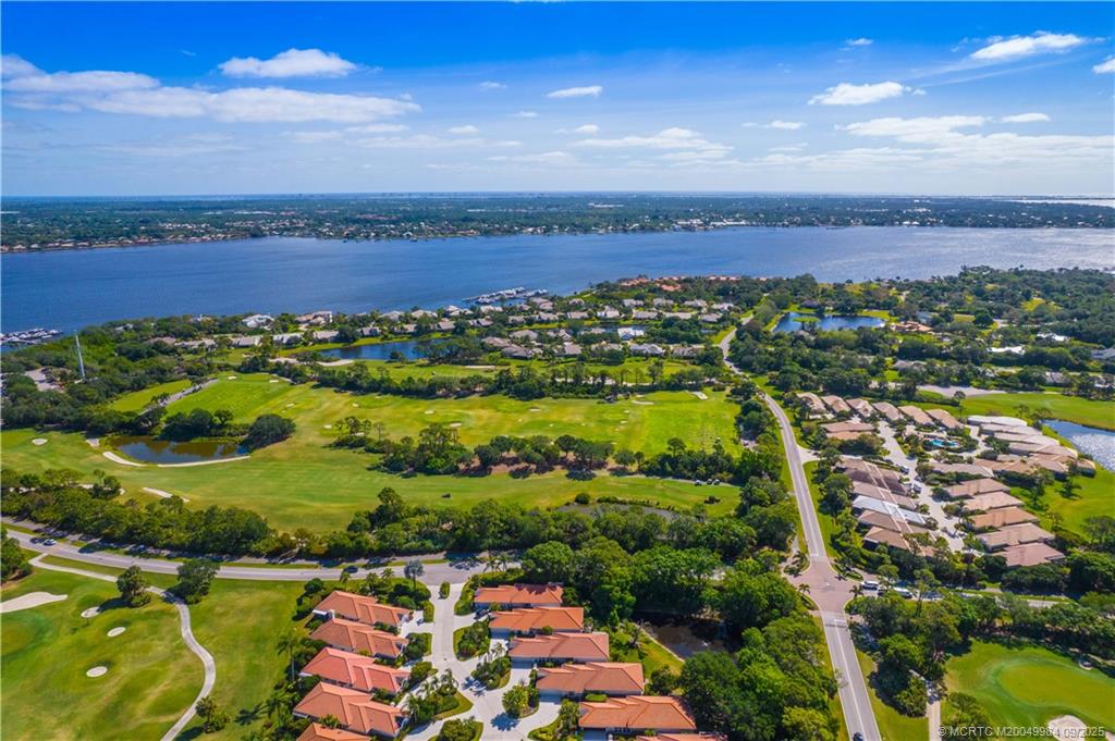 13005 Harbour Ridge Boulevard Palm City, FL 34990 - Photo 36 of 40 an aerial view of residential building and ocean