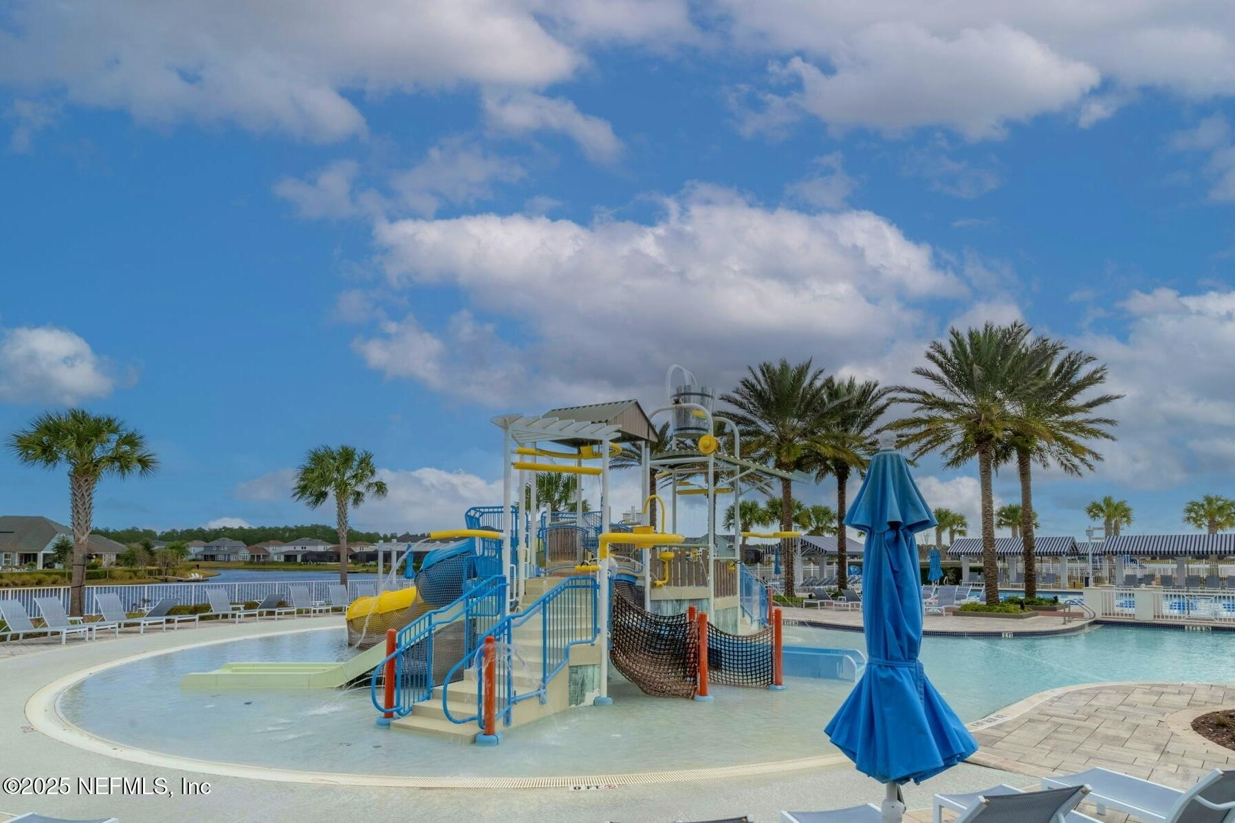 386 Whirlwind Place St. Augustine, FL 32095 - Photo 10 of 41 a swimming pool with outdoor seating and yard