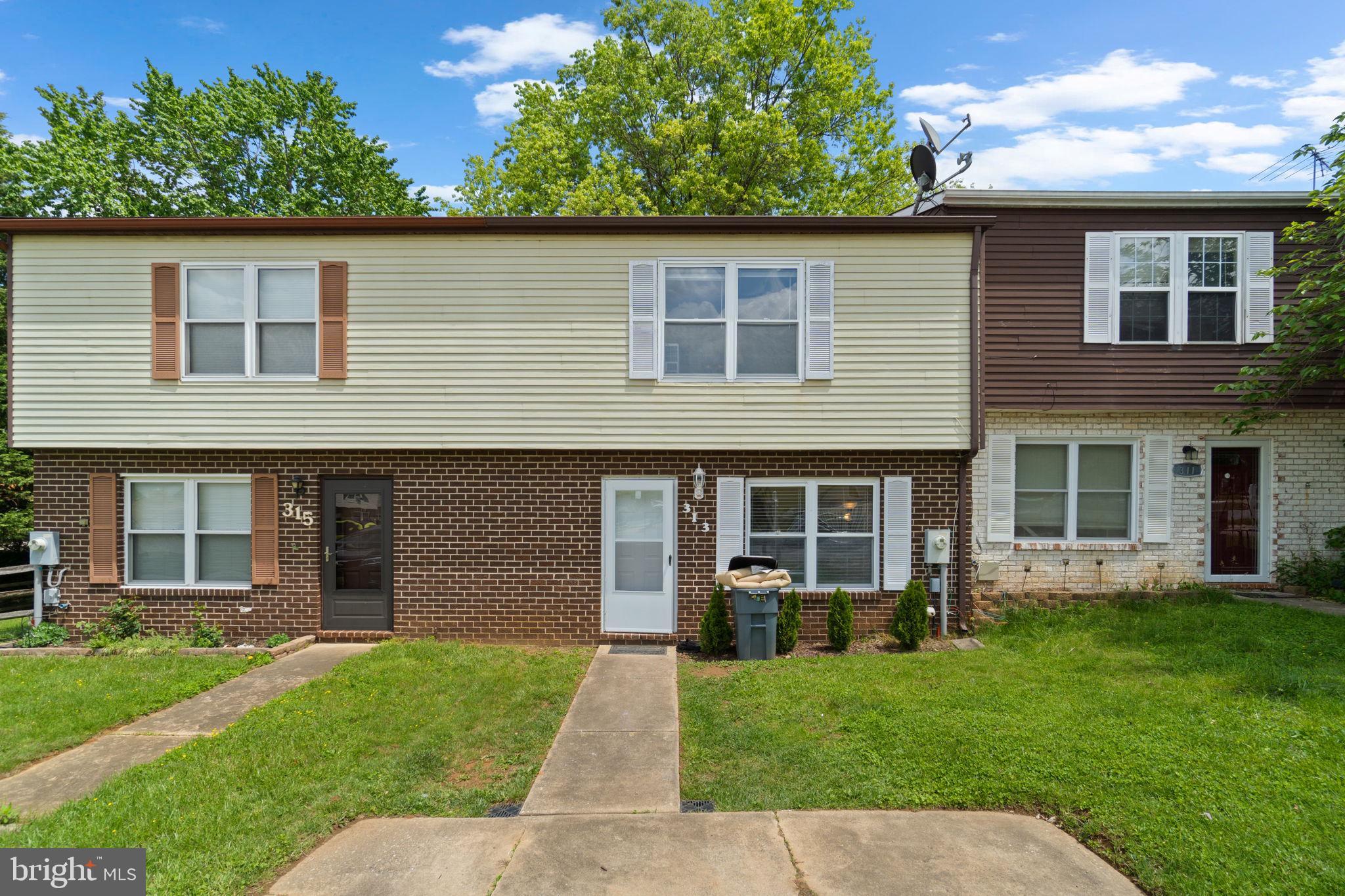 a backyard of a house with a garden