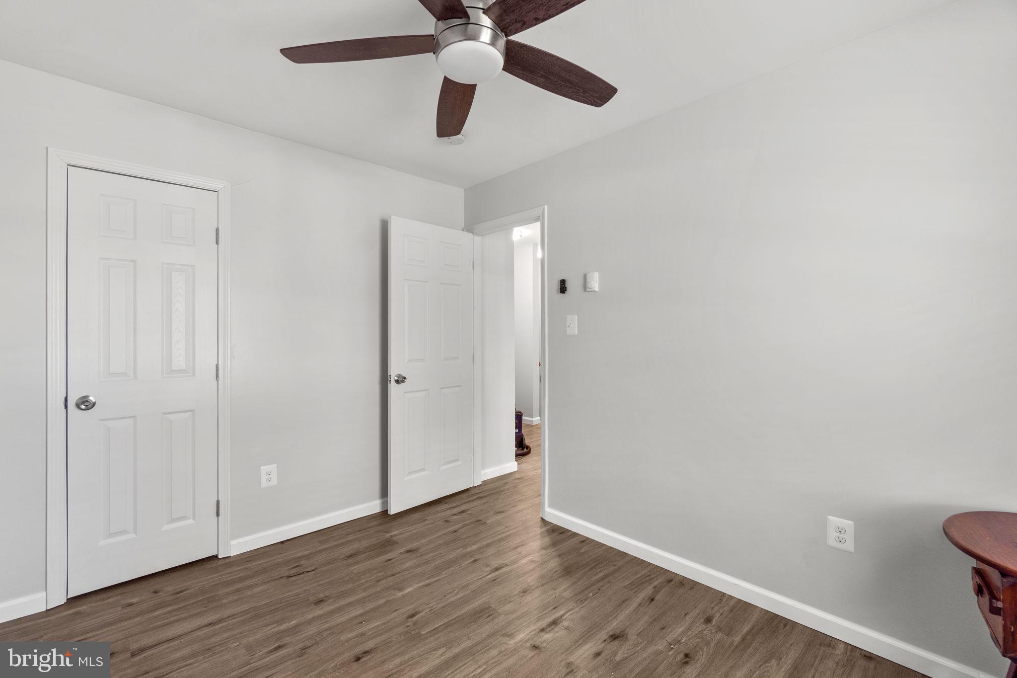 313 Janice Way Westminster, MD 21158 - Photo 16 of 23 wooden floor in an empty room