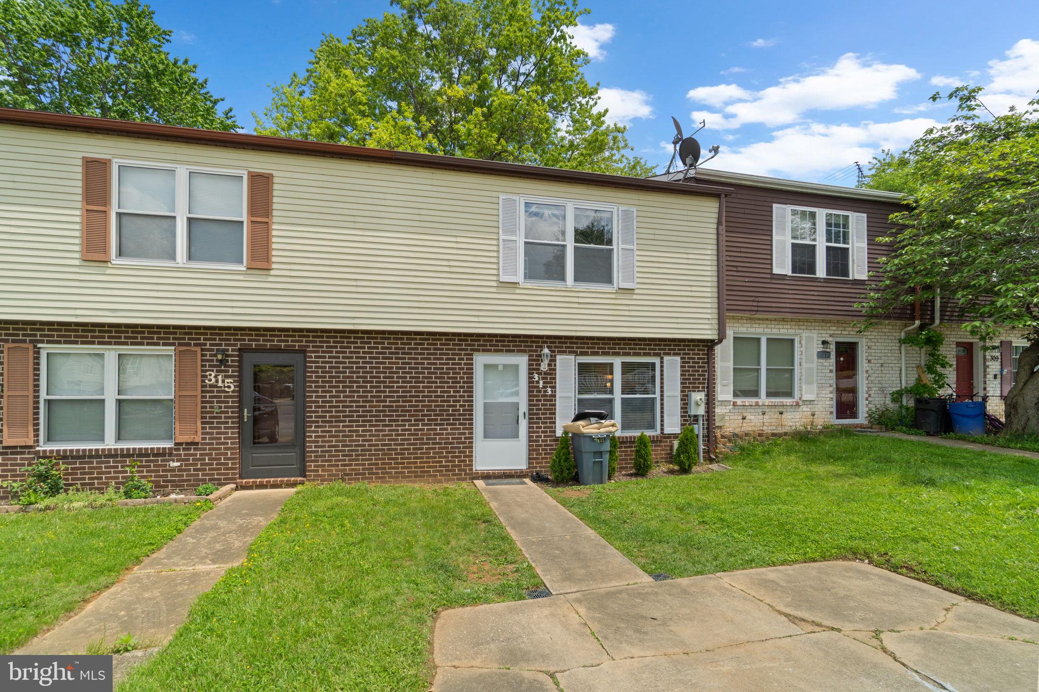 313 Janice Way Westminster, MD 21158 - Photo 2 of 23 a view of a yard in front of a house