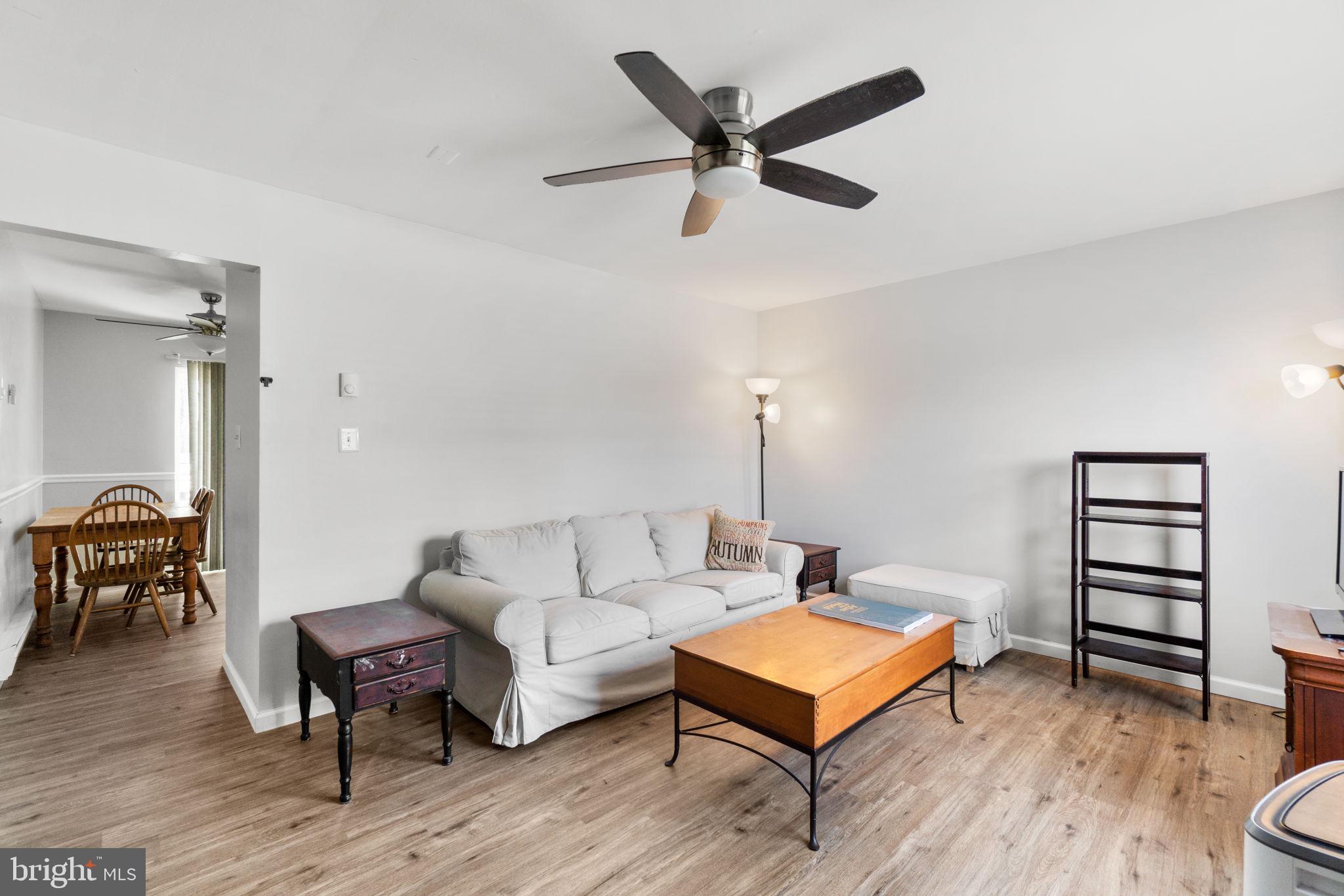 313 Janice Way Westminster, MD 21158 - Photo 3 of 23 a living room with furniture a window and a wooden floor