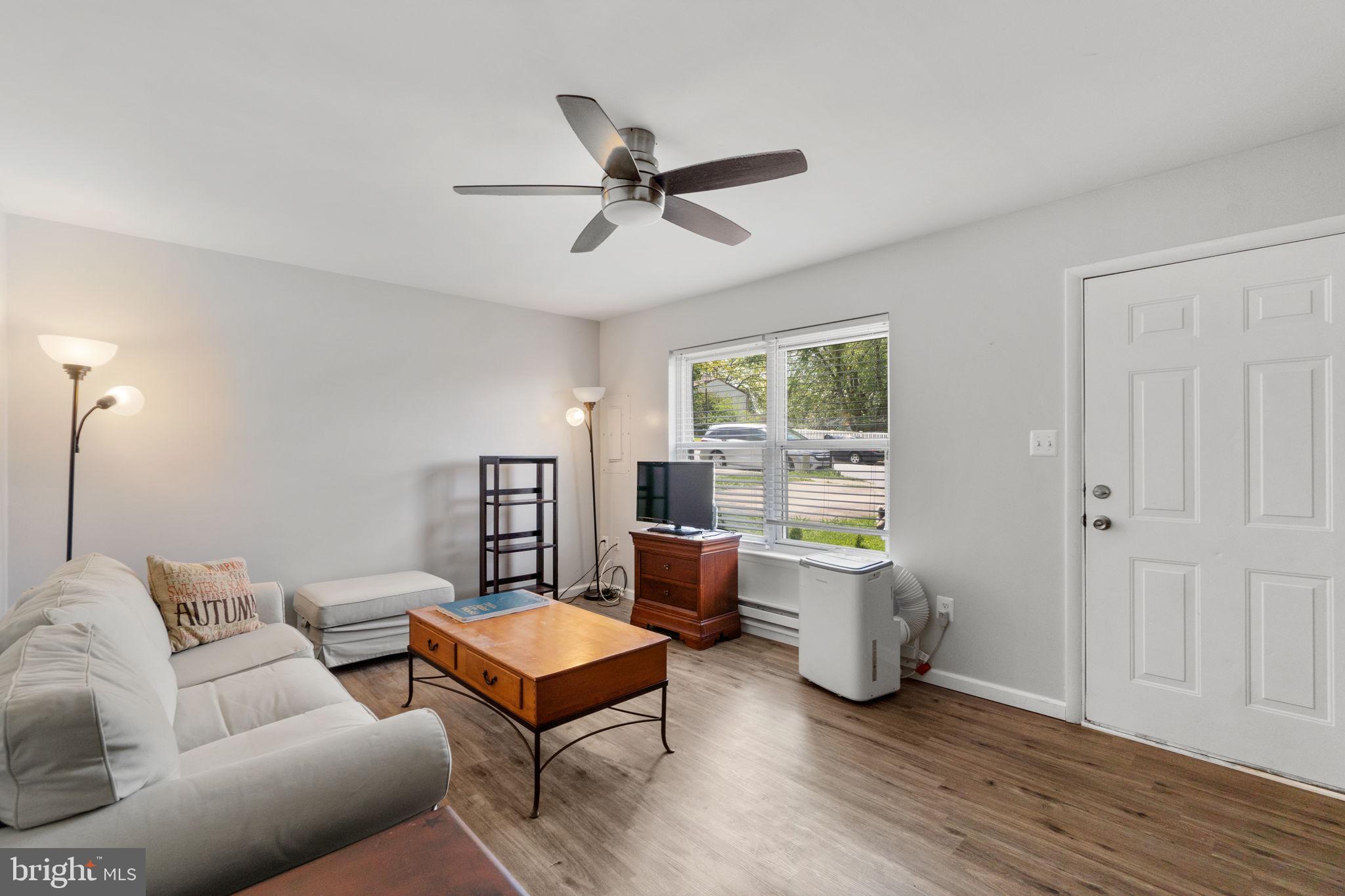 313 Janice Way Westminster, MD 21158 - Photo 4 of 23 a living room with furniture and a wooden floor