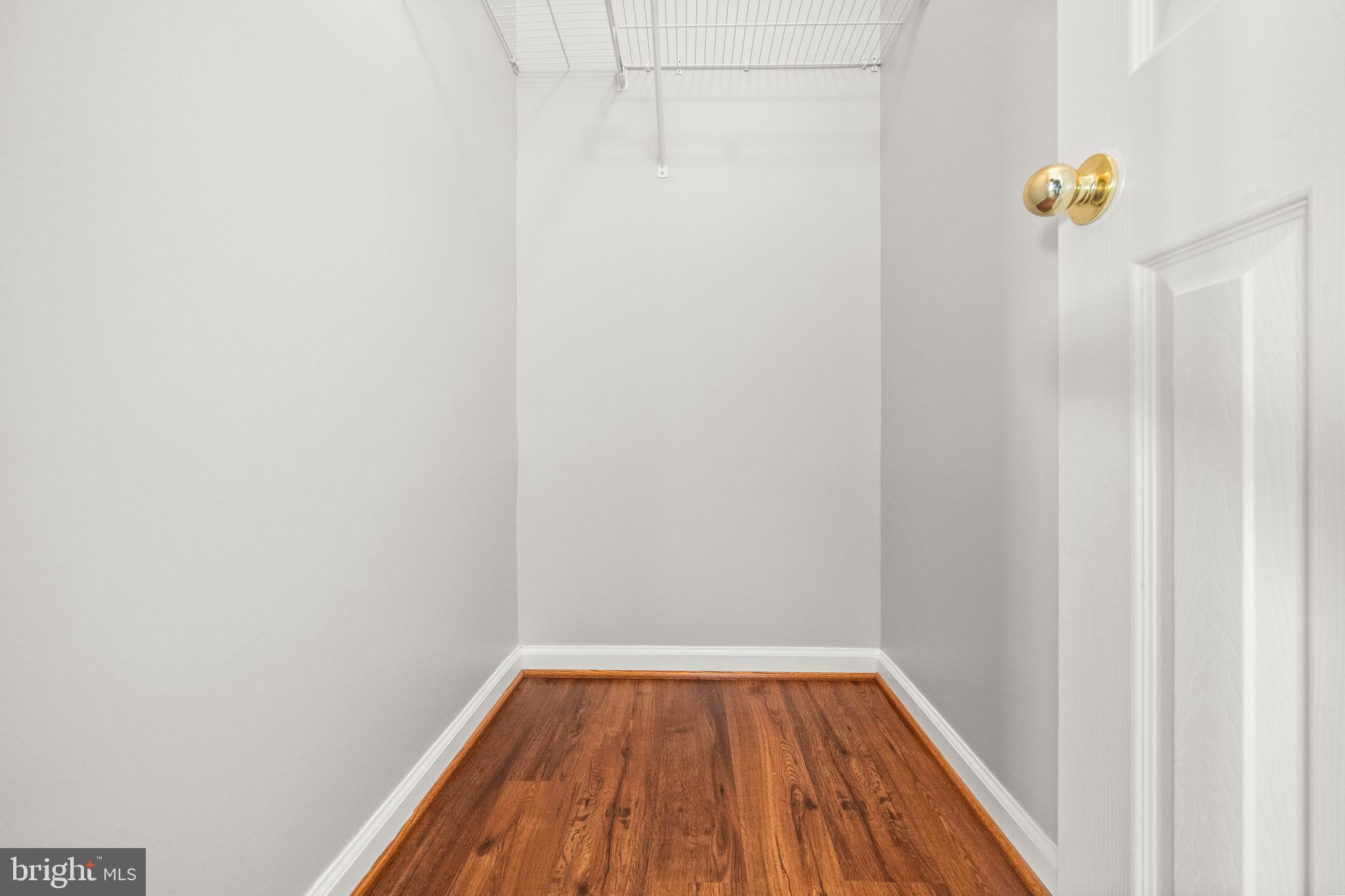 826 Lowe Road Baltimore, MD 21220 - Photo 16 of 35 a view of a small space with wooden floor