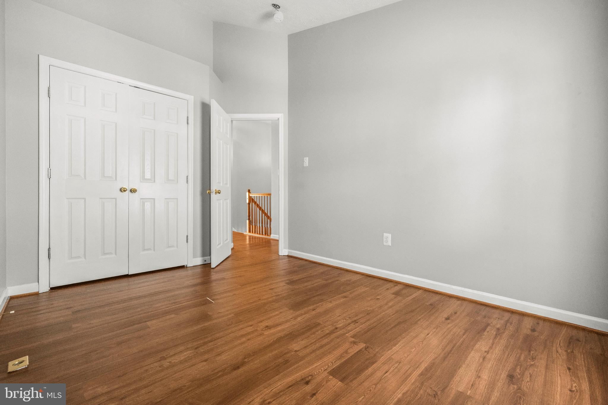 826 Lowe Road Baltimore, MD 21220 - Photo 18 of 35 a view of an empty room with wooden floor