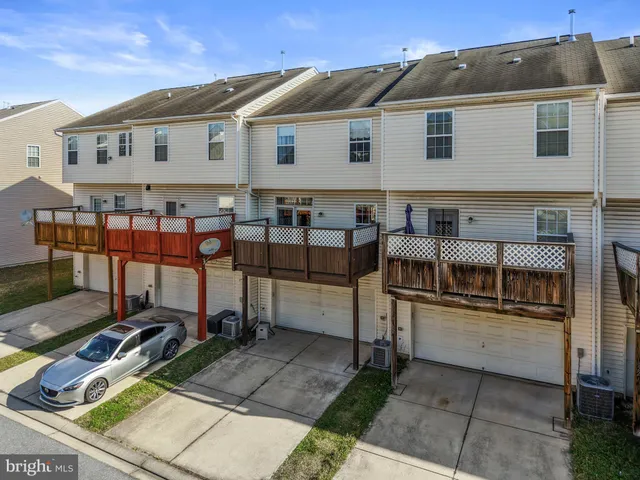 a view of a car park in front of building