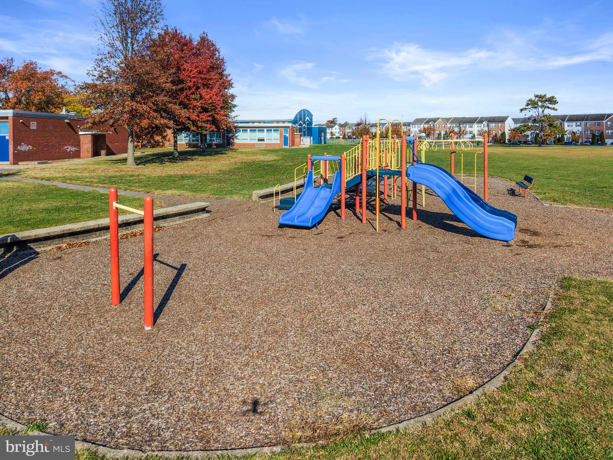 826 Lowe Road Baltimore, MD 21220 - Photo 32 of 35 a view of a park with swings and slides