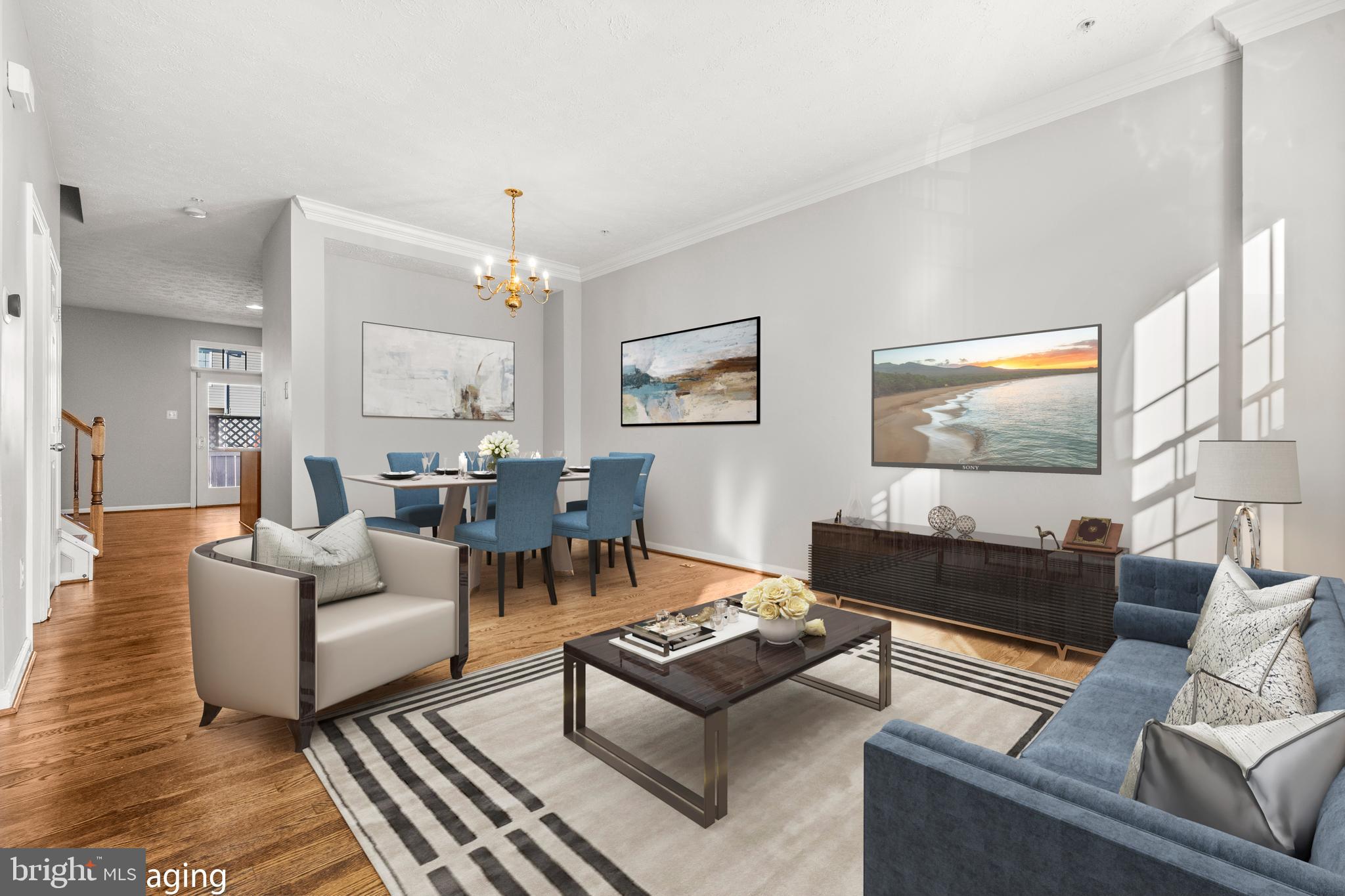 826 Lowe Road Baltimore, MD 21220 - Photo 4 of 35 a living room with furniture and a chandelier